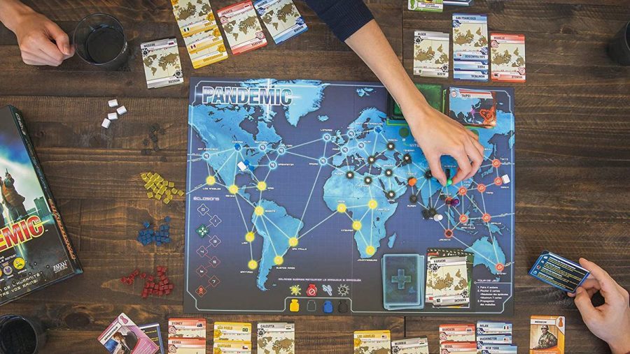 Memory games Pandemic board game being played