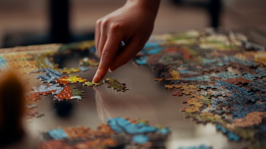 Memory games a jigsaw puzzle being made, credit to Unsplash Ross Sneddon