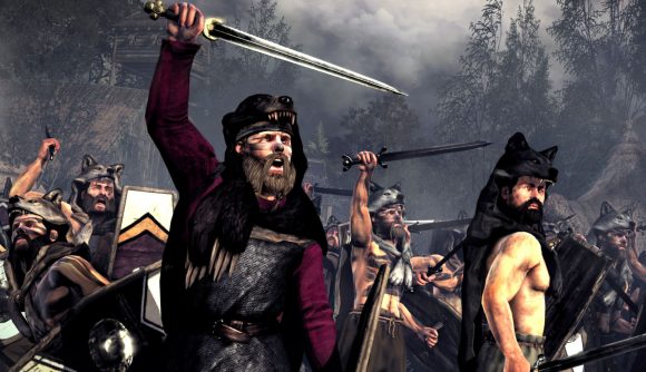 Total War: ROME: The Board Game delayed two Barbarian warriors preparing to charge in battle