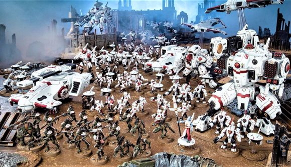 Warhammer 40k 9th edition Tau codex sept rules reveal - Warhammer Community photo showing an army of Tau models in the Viorla sept scheme