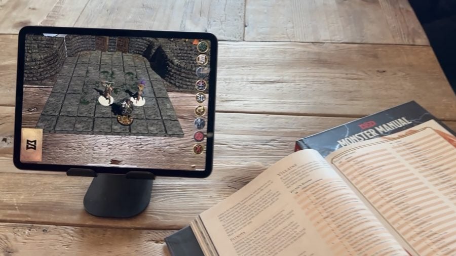 D&D Mirrorscape Augmented Reality platform and accessibility for players - Author photo showing an AR duingeon map on a tablet screen, with an open D&D sourcebook nearby