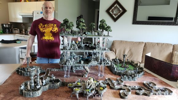 DnD setups Florida man - Todd's photo showing himself with a tabletop setup featuring a multi level dungeon