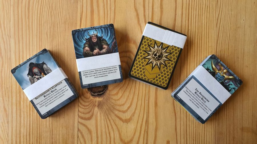Warhammer Underworlds Nethermaze review - author photo showing the provided card packs from the game