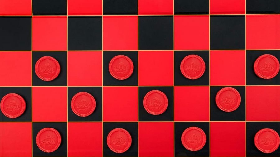 How to play checkers - a red and black checkerboard with red pieces on blacks squares, seen from above