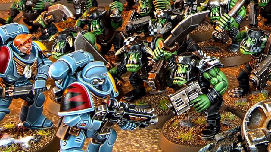 Warhammer 40k detachments guide - Warhammer Community photo showing Space Wolves and Orks models fighting