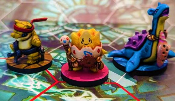 DnD minis Pokemon - tabletop RPG miniatures of the Pokemon Sandshrew (left), Togepi (centre), and Lapras (right)