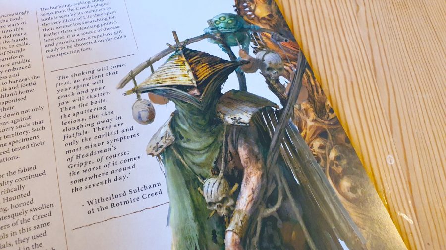 Warhammer Age of Sigmar Warcry: Heart of Ghur review - author photo showing a rulebook artwork of the Witherlord, leader of the Rotmire Creed warband